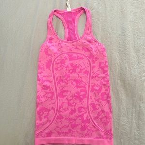 Bright pink Lululemon tank